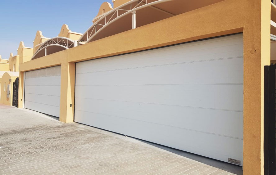 6 Reasons Why Sectional Overhead Doors Beat Traditional Rolling Doors for Small Garage